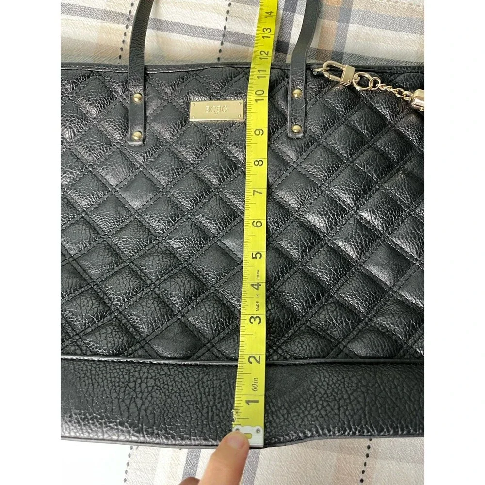 BCBG Women's Black Quilted Faux Leather Tote Bag with Tassel Accent